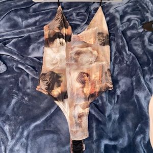 Brand new multi color body suit